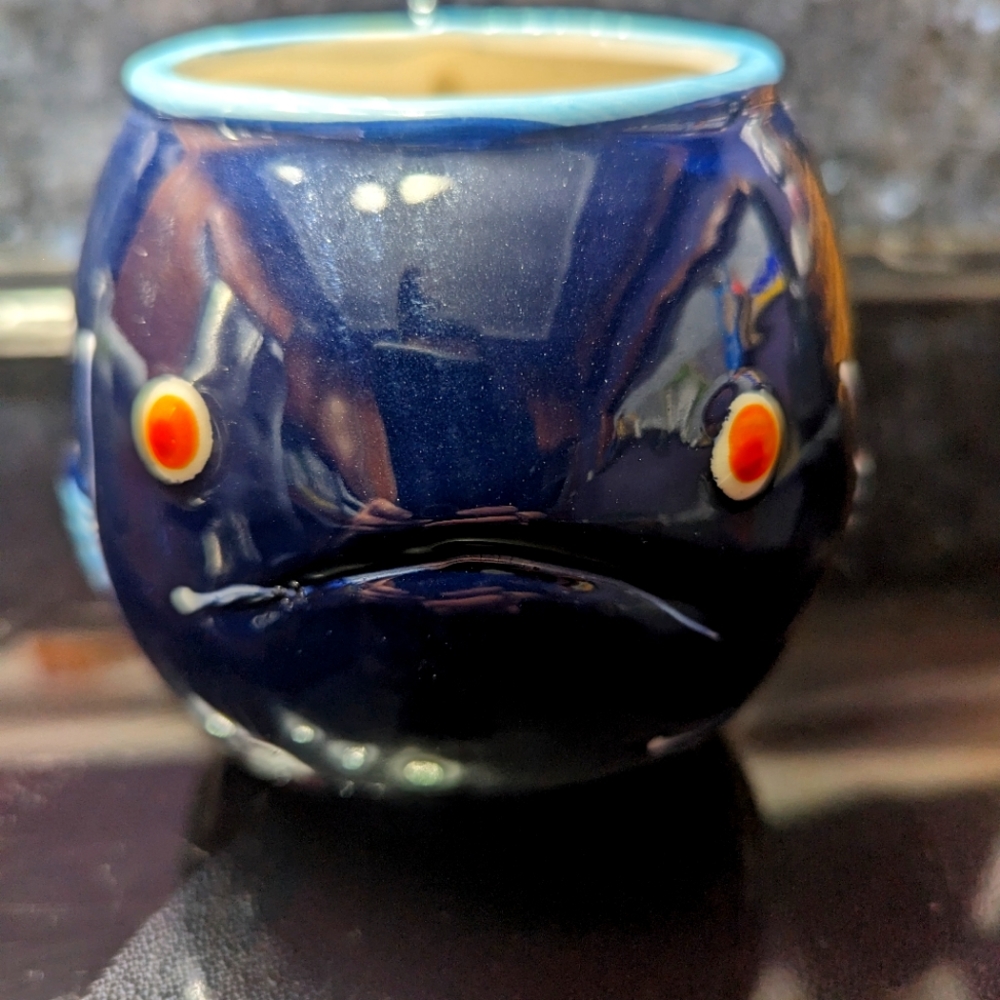 Blue fish mug. Small chip on handle (shown in photo). Boston Warehouse brand.